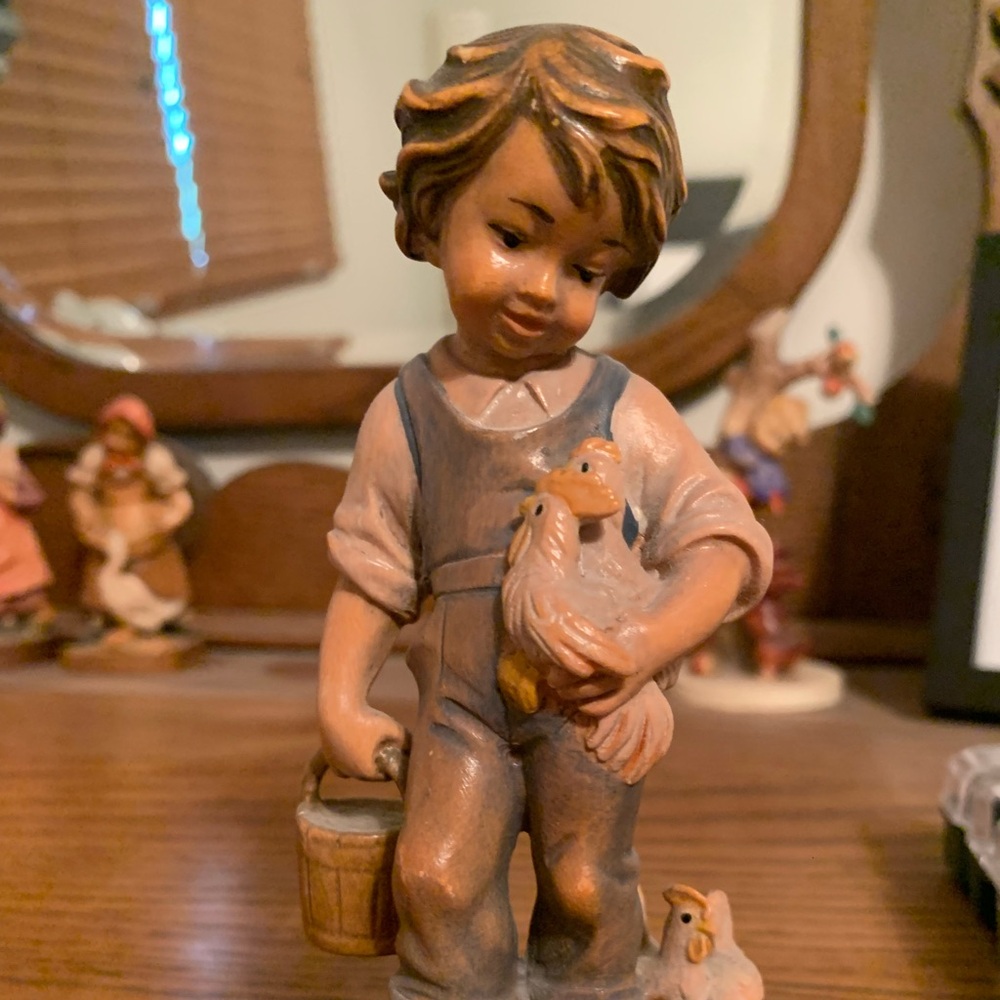 Boy with Goose Wooden Figurine